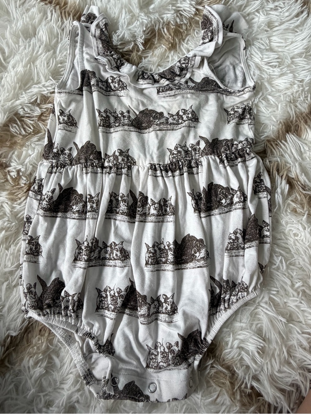 Kate Quinn white rabbit romper